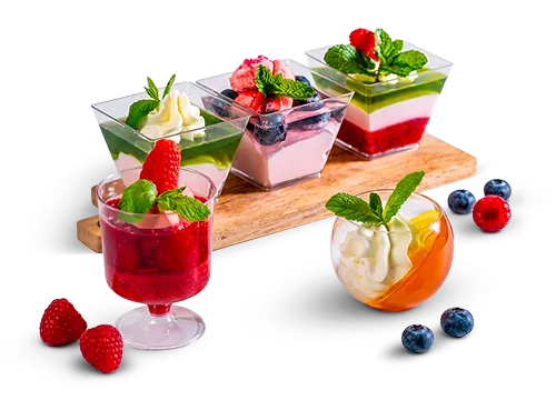 Assorted Tiny Indulgence handcrafted dessert cups with berries, cream, and mint